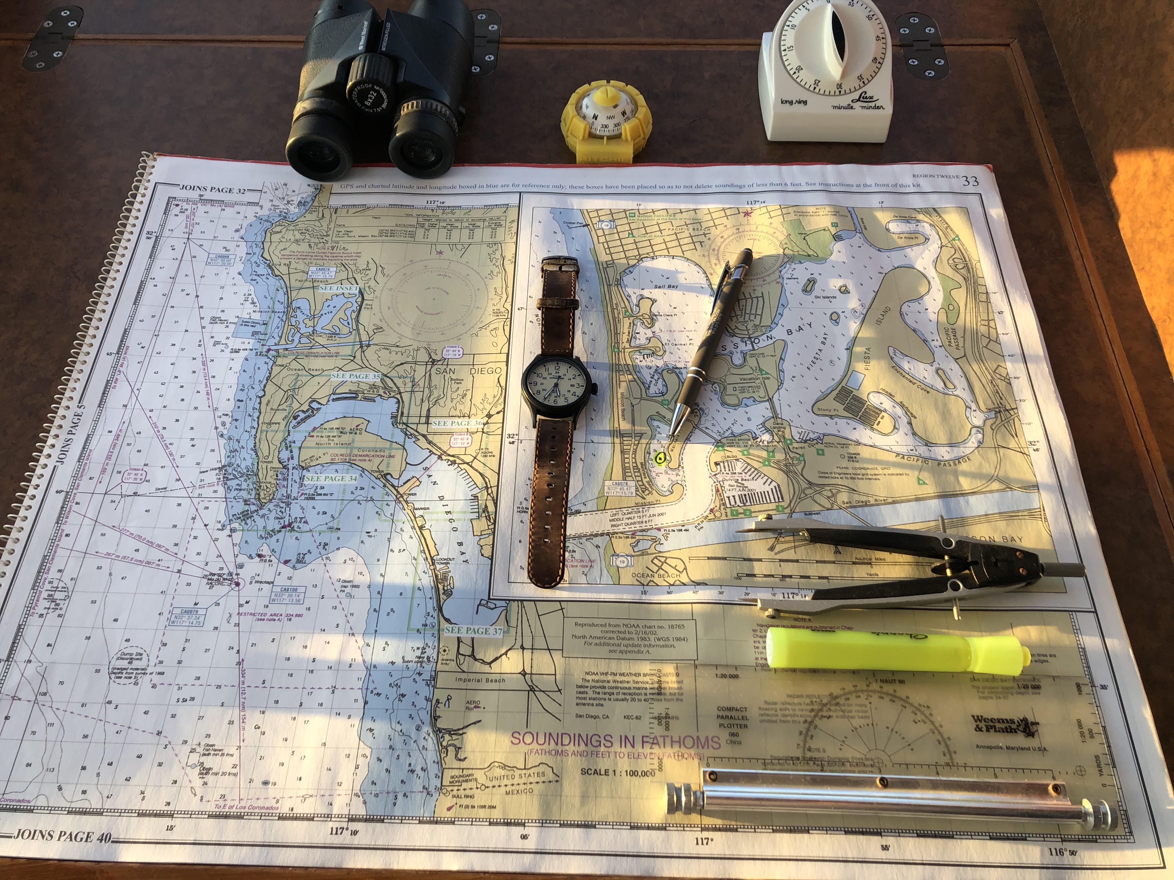 Boating map of San Diego harbor along with nautical navigation tools.