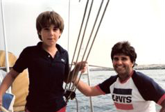 Two SDSA alumni on a boat